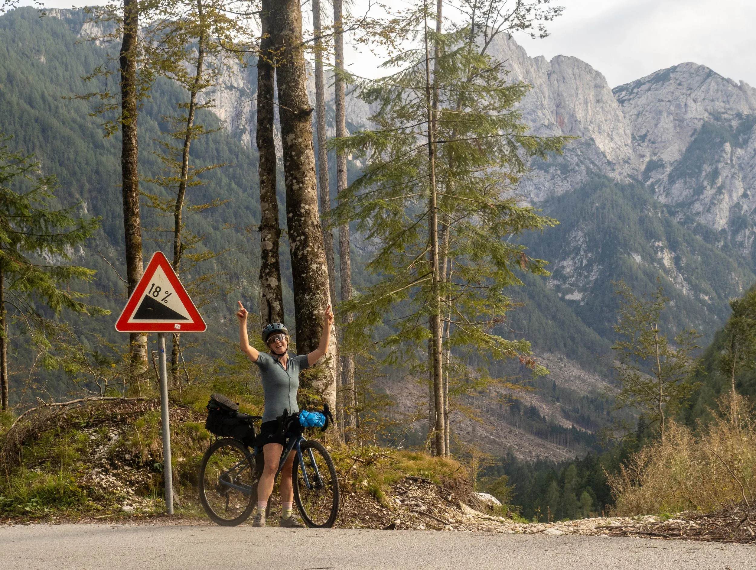 Celebrating at the top of our last steep climb of the day!