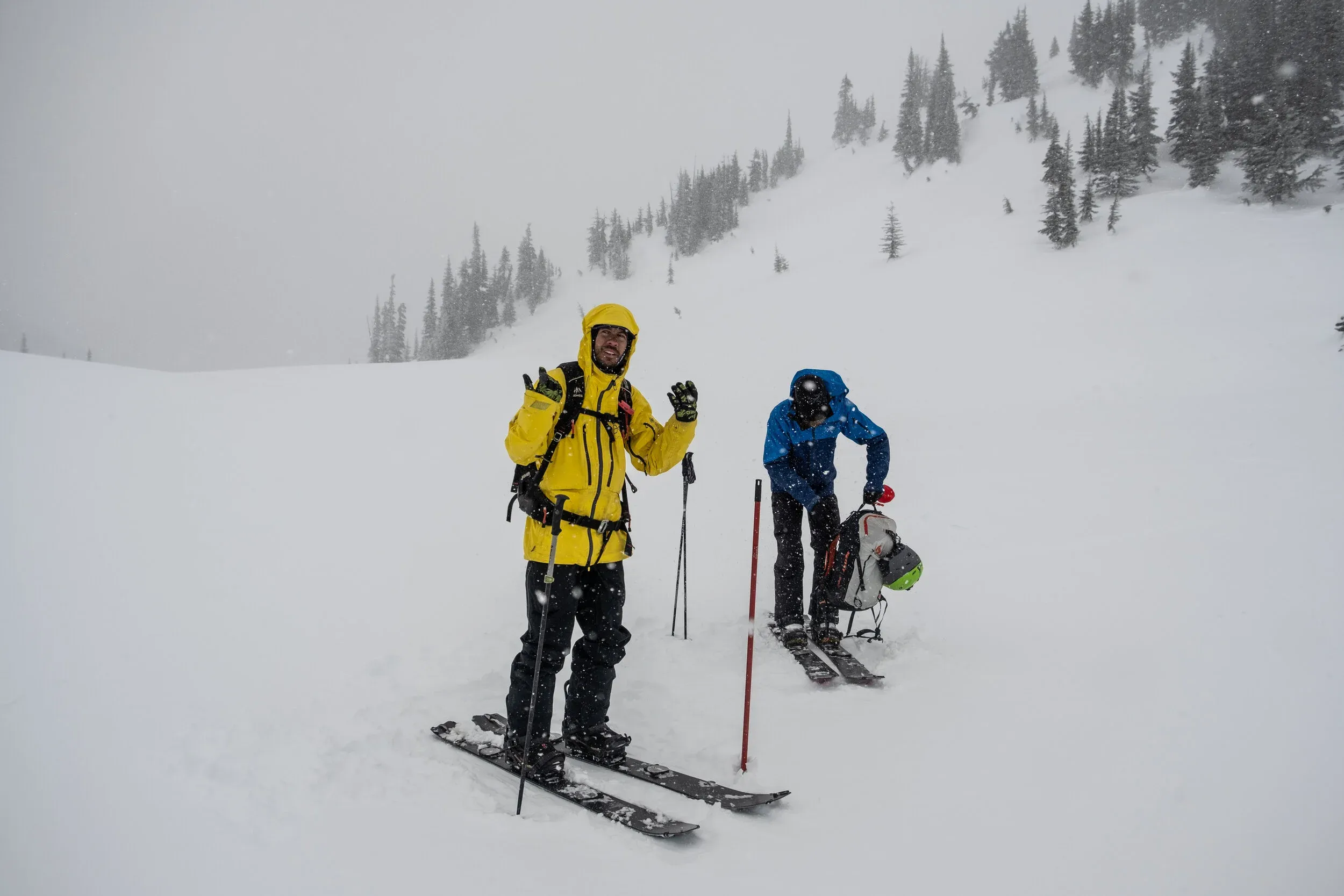 Holmes, rocking a makeshift broomstick ski pole after his 11th collapsible BD pole exploded in his hand that morning. His stoke level obvious.