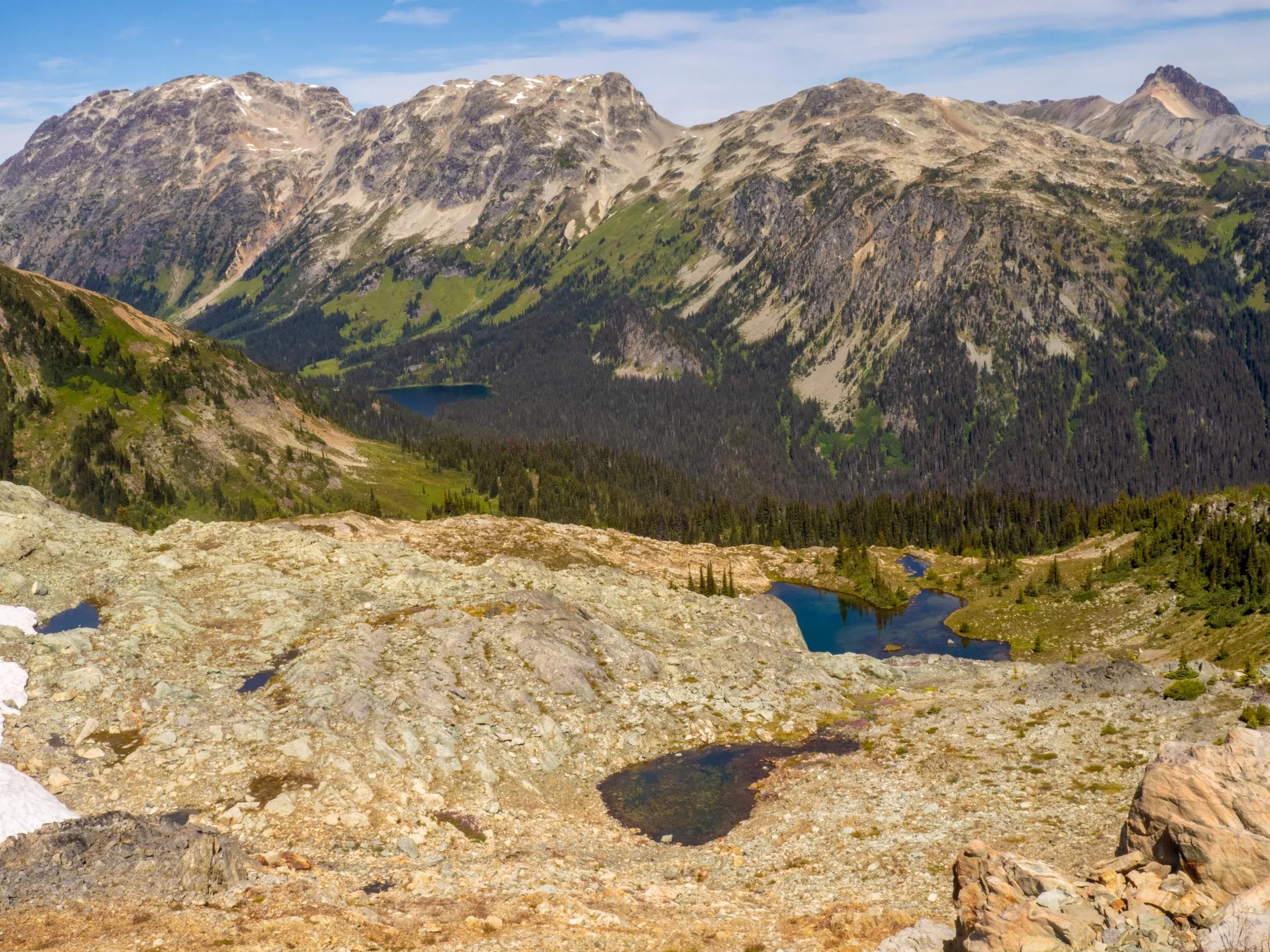 First views of Tenquille Lake in the distance on the left.